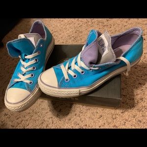 Women’s converse size 7. Kept in the box.